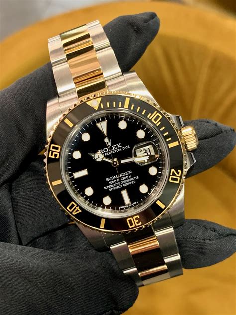 rolex submariner oystersteel yellow gold|rolex submariner list price 2022.